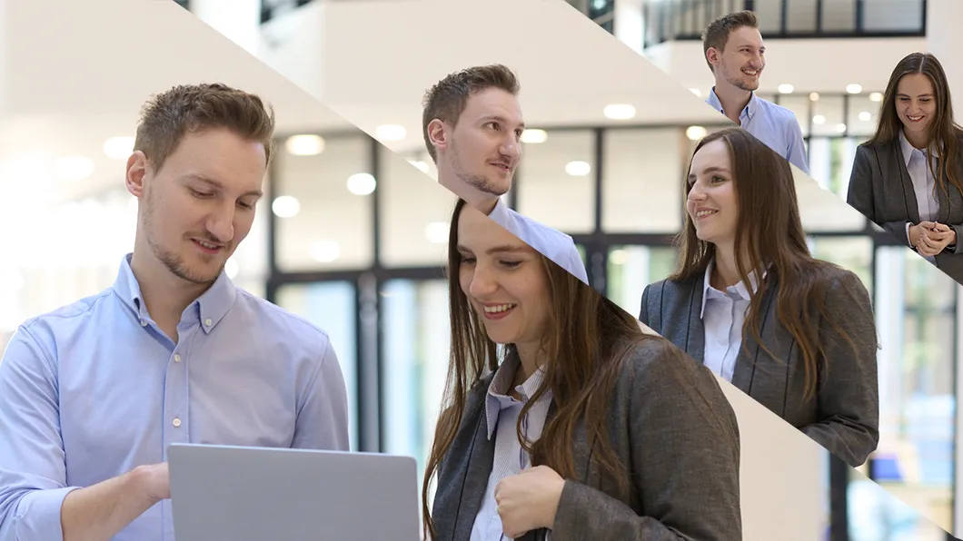 Zwei junge Kolleg:innen bei BDO im Gespräch und beim gemeinsamen Arbeiten im modernen Büro, freundliche Atmosphäre.