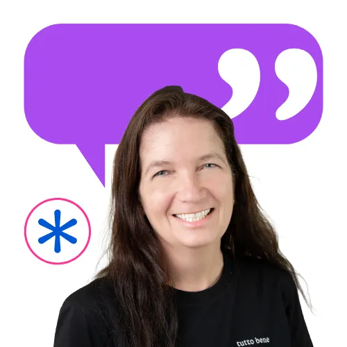 Smiling woman in a black t-shirt with a purple speech bubble and asterisk symbol, representing collaboration at collaboration Factory AG.
