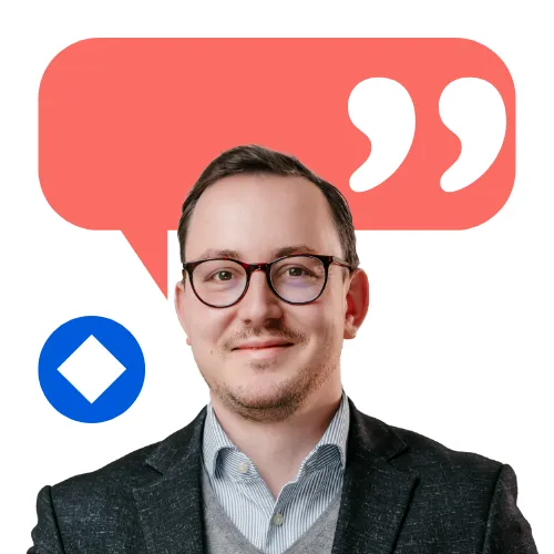 Smiling team member in business attire with a chat bubble and quote marks, representing open communication at collaboration Factory AG.