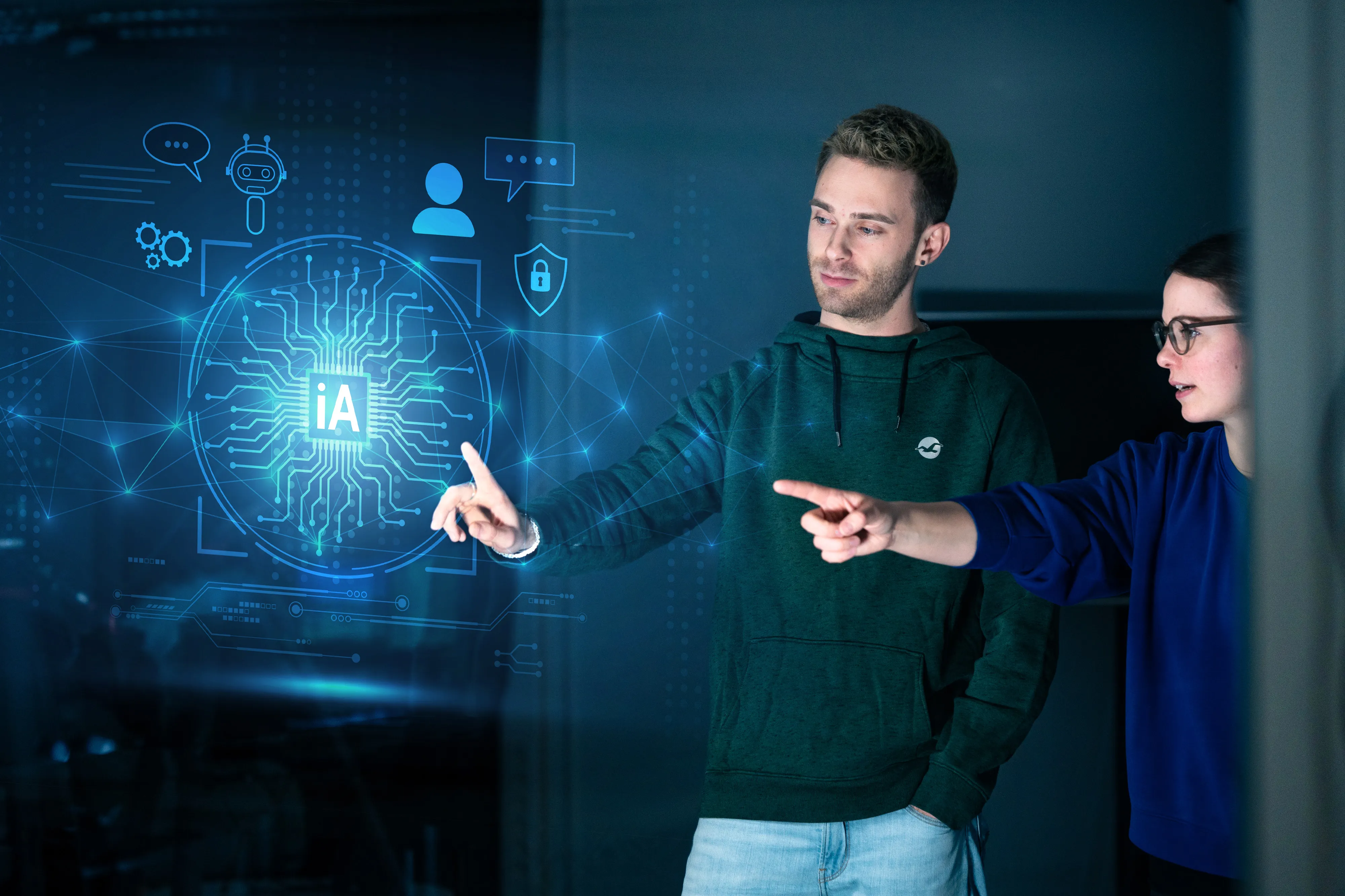 Two young professionals interacting with a futuristic AI interface