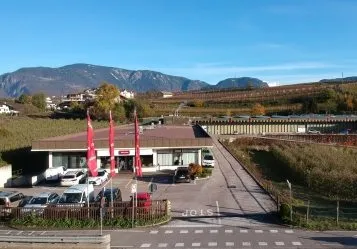 Explore your career at Miele Italy's scenic location, nestled in a picturesque valley with mountain views.