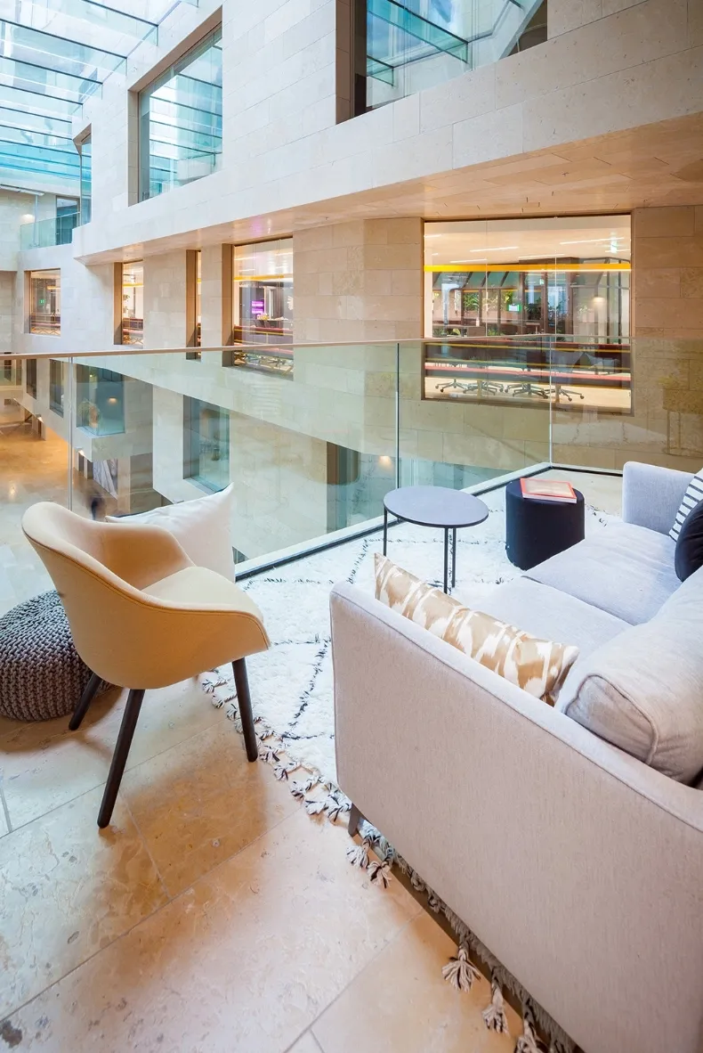 Bright, modern lounge area at Miele with comfy seating, perfect for casual chats or a quick break in the office.