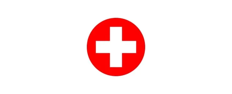 Ein rotes Kreis-Symbol mit weißem Kreuz auf weißem Hintergrund, das an medizinische Hilfe erinnert.