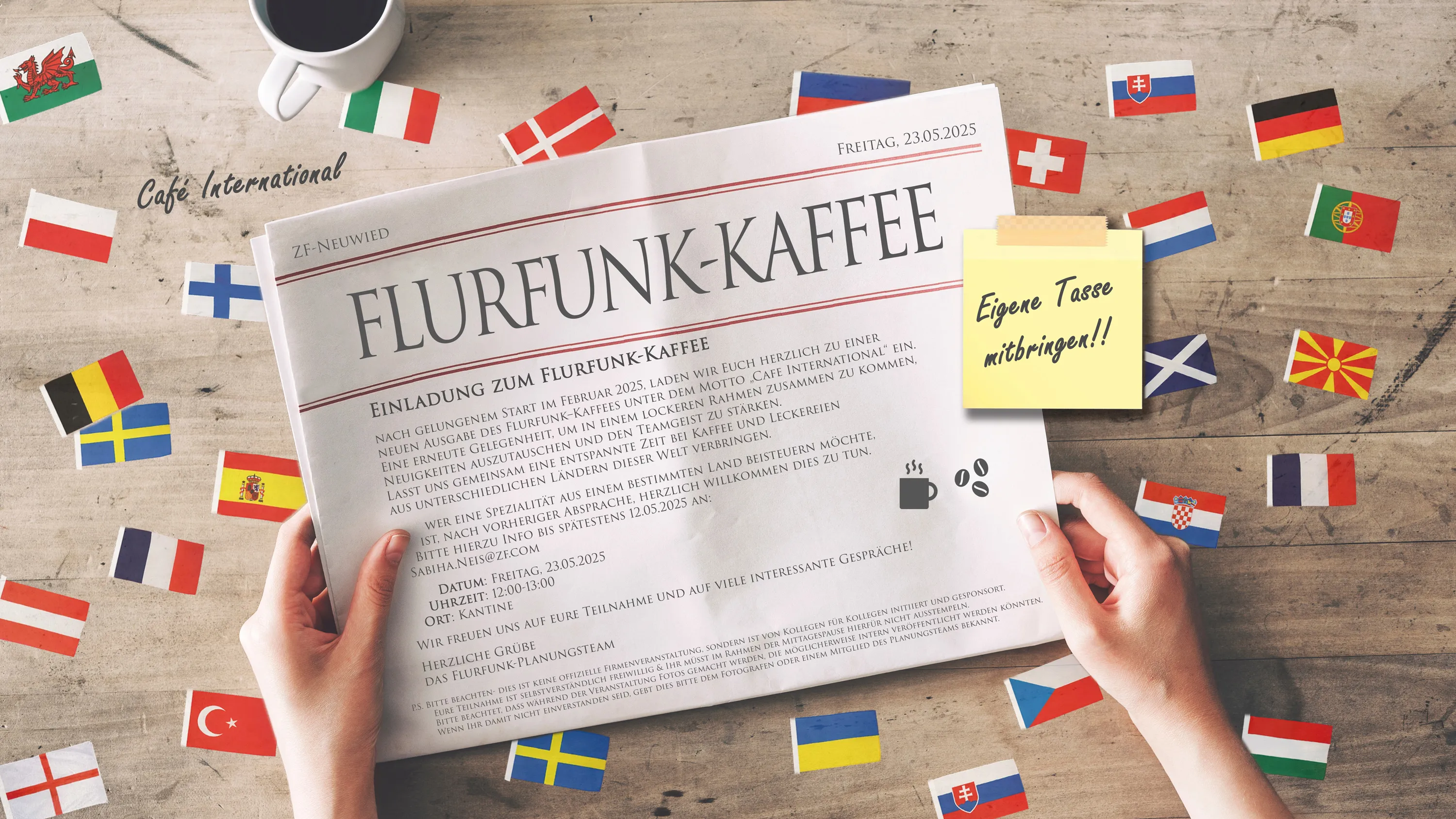 Zwei Hände halten eine Einladung zum internationalen Flurfunk-Kaffee bei ZF, umgeben von Länderflaggen und einer Tasse Kaffee.